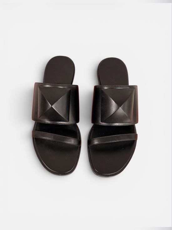 Hermes Shoes - Hermès Caia Slides
Black 37 Preowned